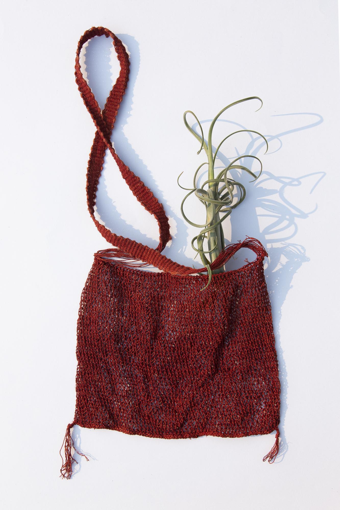 Embroidered tote bag detail with metallic thread